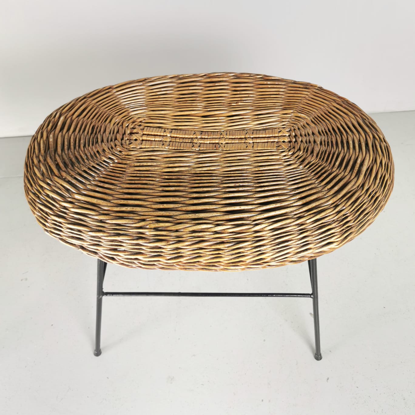 Vintage wicker armchair and pouf from the 50s