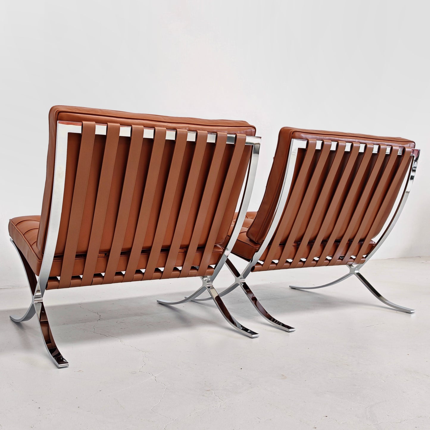 Coppia di ICONICHE POLTRONE IN PELLE COGNAC Tabacco Poltrone Barcelona Ludwig Mies van der Rohe per Knoll