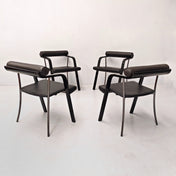 4 black armchair-style chairs with armrests, vintage 1980s