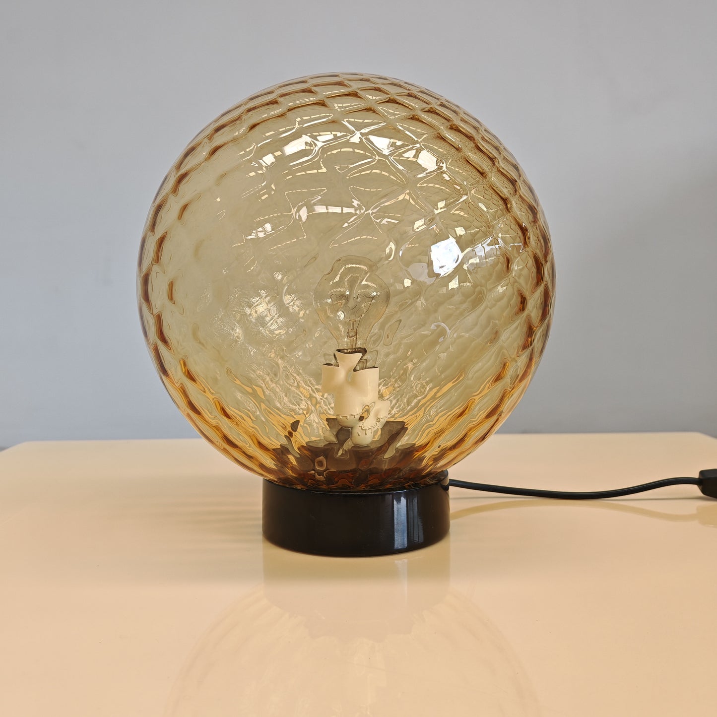 Lampada sfera in vetro ambra stile Balloton Venini anni 70