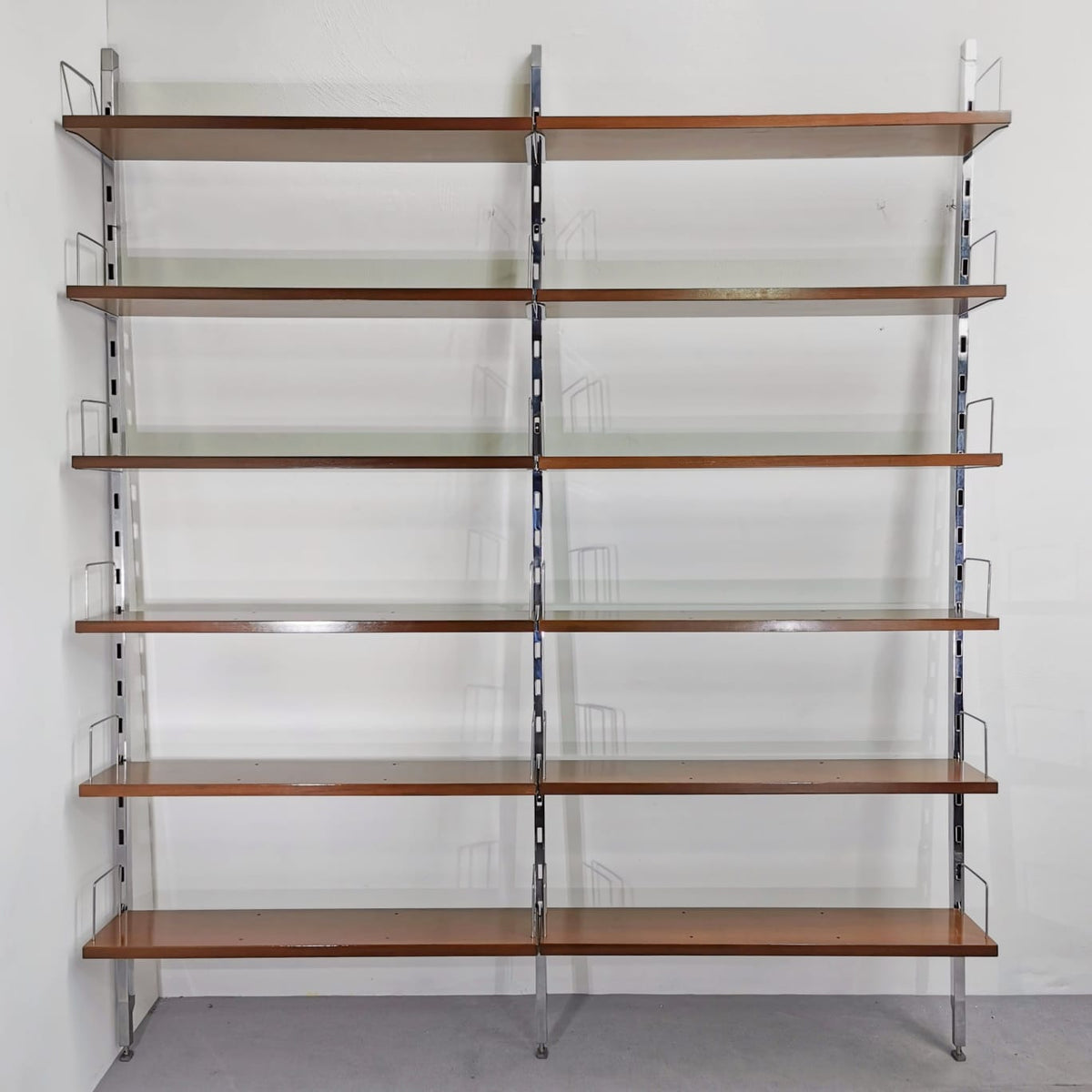 Libreria scaffalatura a muro in Teak e Acciaio disegnata da ICO Parisi e  prodotta da MIM  negli anni 60