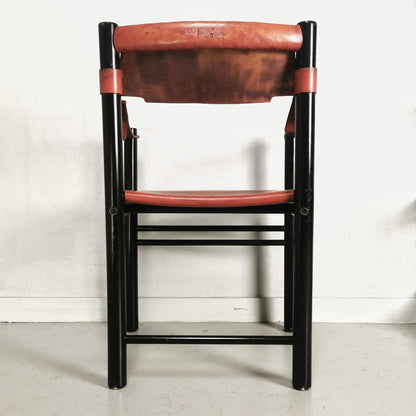 Hibiscus leather chair with armrests from the 80s